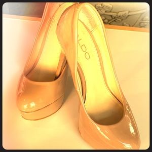 ALDO nude patten leather heels.